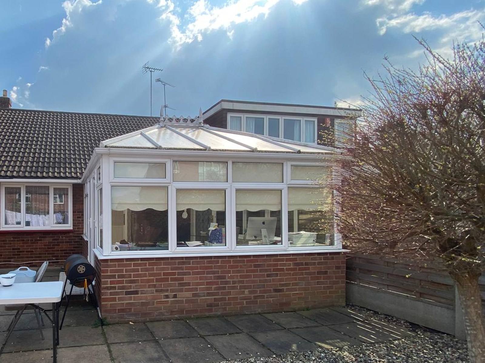 Before: dated bungalow with conservatory
