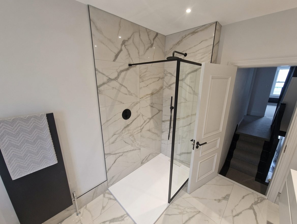 Shower enclosure detail with black fittings