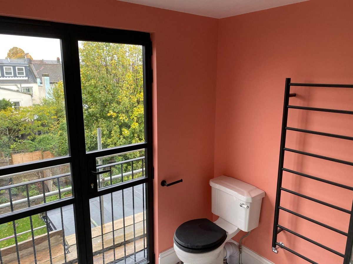 Terracotta en-suite with Crittall-style garden doors